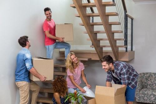 Removal team planning a move in a Notting Hill street