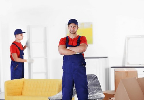 Removal team planning a move in a Notting Hill street with period properties