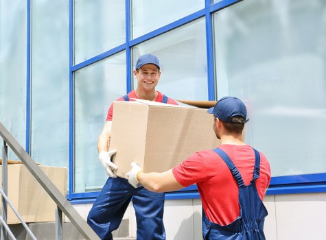 Moving team preparing items safely before loading