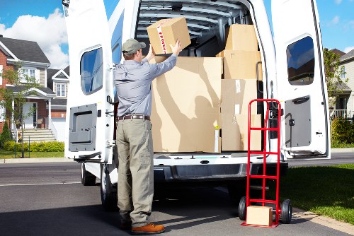 Careful loading of furniture and boxes for a move in West London
