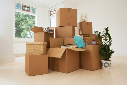A structured office move with labelled boxes and desks