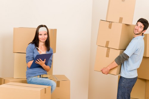 Loading furniture into a removals van near Notting Hill flats